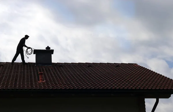 Chimney technician at work
